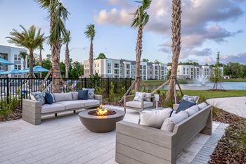 Outdoor gathering area with grilling station & fire pit